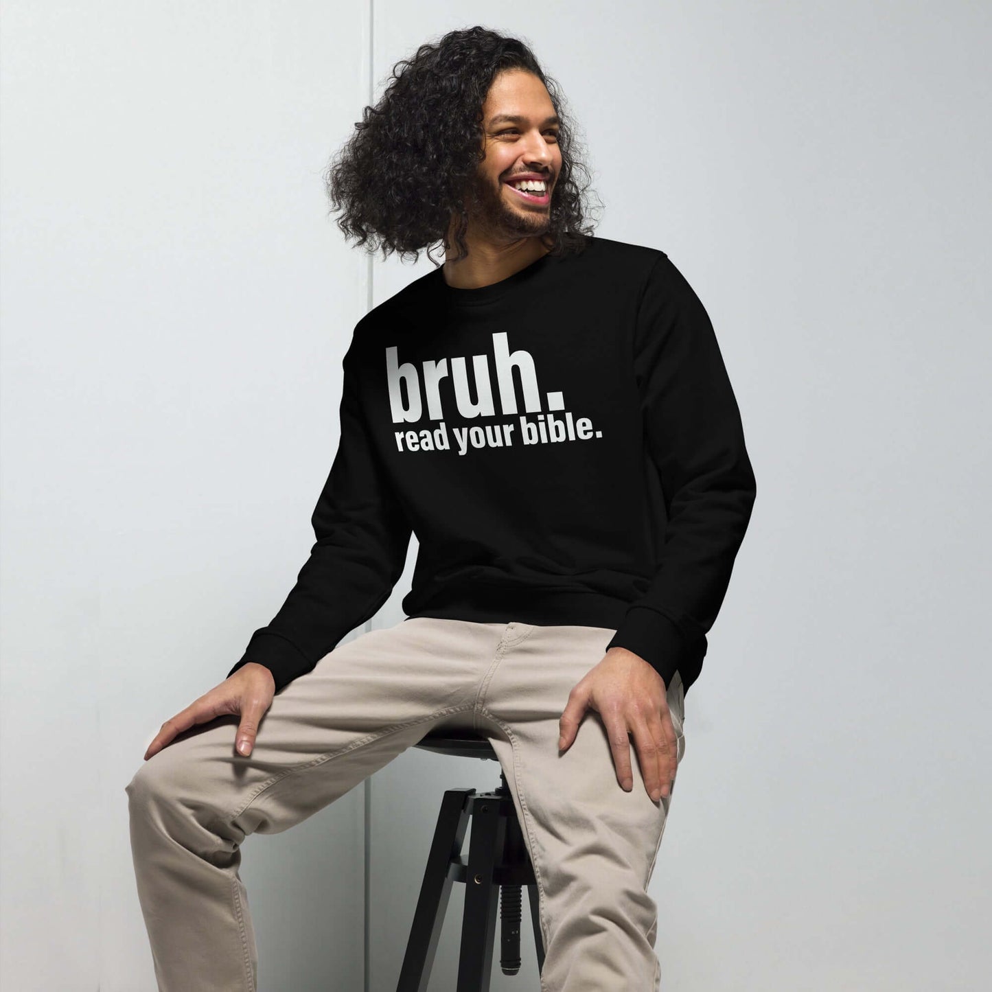 Man wearing "Bruh, Read Your Bible" Christian sweatshirt, promoting Scripture wisdom and faith-based conversations.