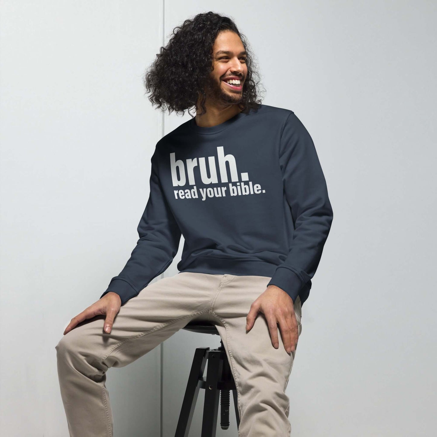 Man wearing "Bruh, Read Your Bible" Christian sweatshirt, promoting Scripture wisdom in stylish Christian clothing.