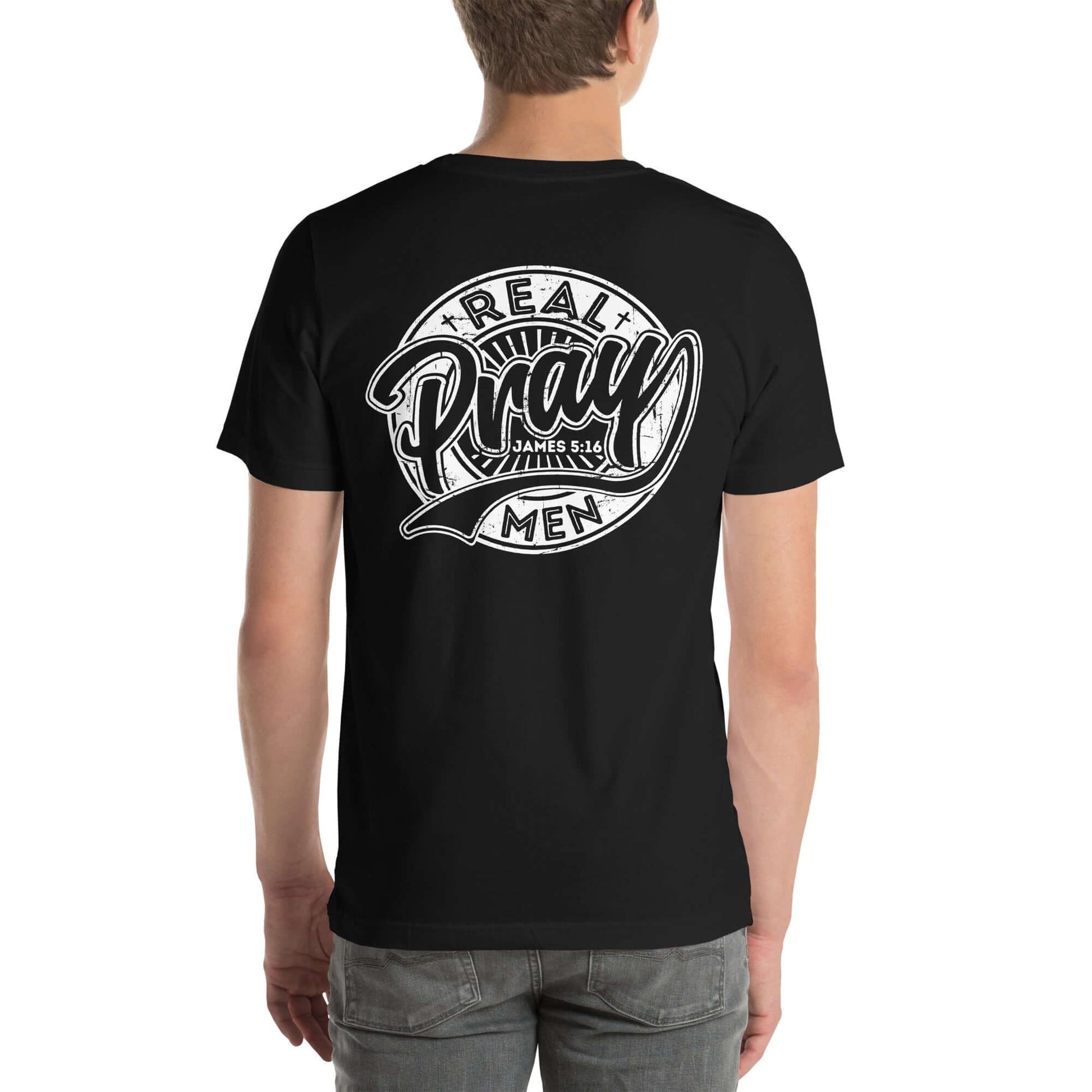 Back view of men's "Real Men Pray" Christian t-shirt in black, showcasing bold prayer-themed design.