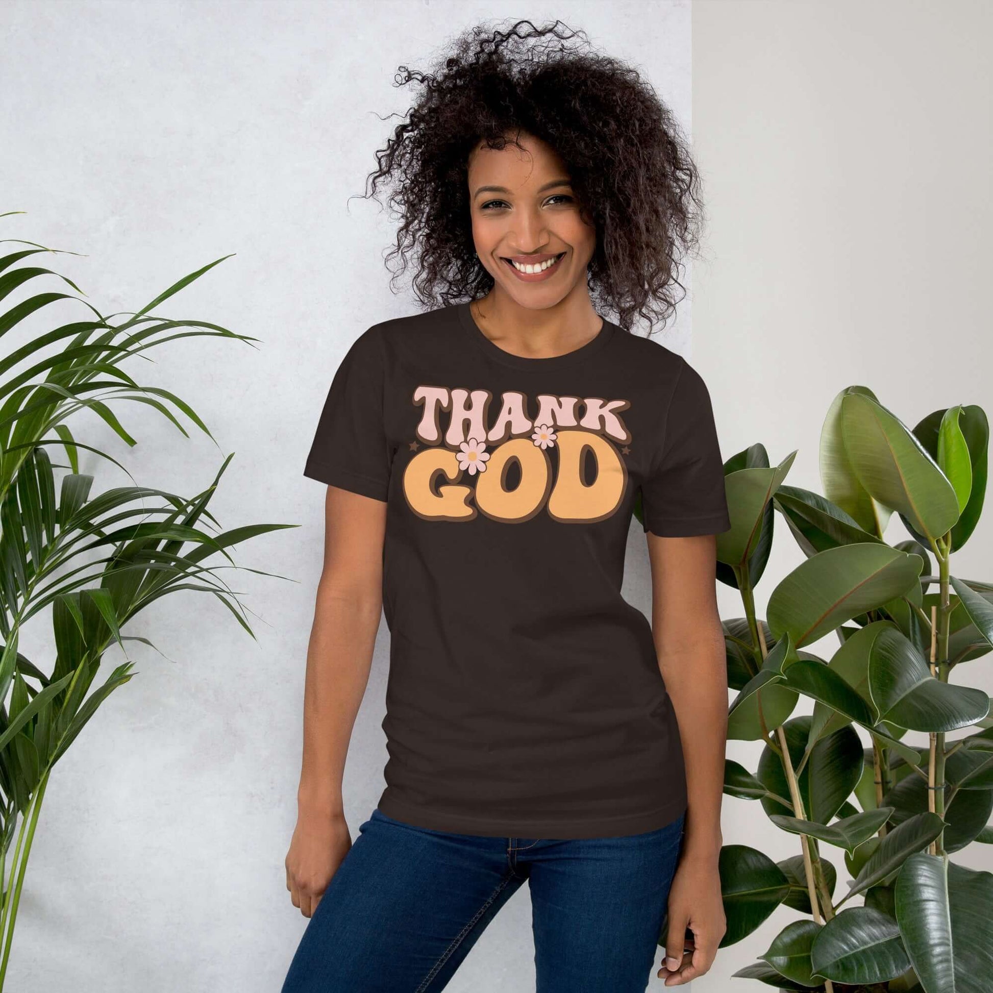 Woman wearing a "Thank God" Christian T-shirt, representing faith and gratitude in stylish design. Christian clothing UK.