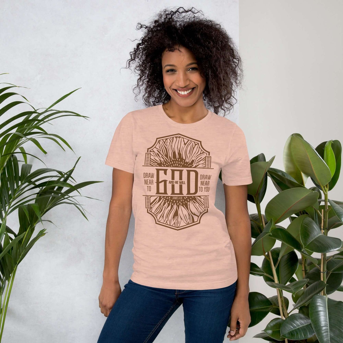 Women's Christian T-shirt in pink with "Draw Near to God" design, promoting faith and inspiration in UK Christian clothing.